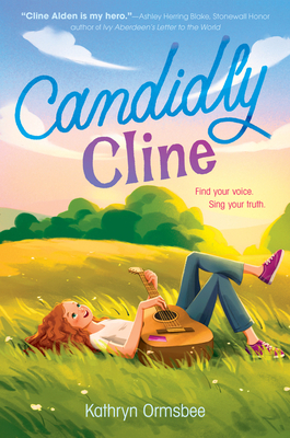 Cover of "Candidly Cline" by Kathryn Ormsbee. Blue and purple text over an illustrated image of a red-haired girl laying carefree in a field of grass with a guitar across her lap. From November's Most Anticipated LGBTQIA+ Literature.
